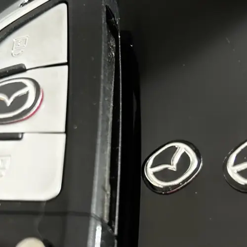 Alternative view of 1x MAZDA new Schlüssel 13x11mm Aufkleber ALU Schlüssellogo Emblem Schriftzug LOGO