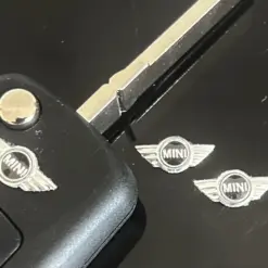 1x MINI Aufkleber 3D Schlüssellogo 14x6mm Emblem Schriftzug Logo ALU