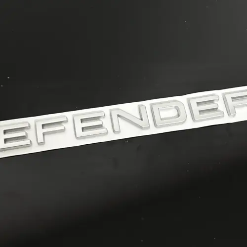 1x neu DEFENDER Emblem 205mm silber matt Schriftzug Logo OVP Range Rover Land Rover