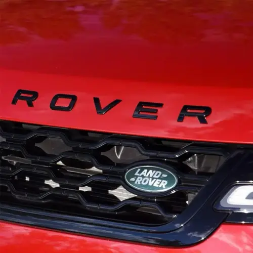 1x neu LAND ROVER Grill Emblem 8,6 x 4,3cm grün/silber Emblem Schriftzug Logo LR053190 – Ansicht 1