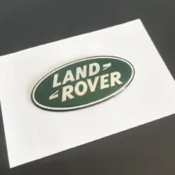 1x neu LAND ROVER Grill Emblem 8,6 x 4,3cm grün/silber Emblem Schriftzug Logo LR053190