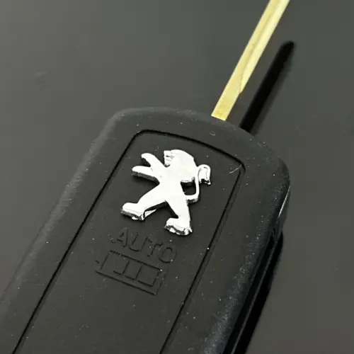 1x Peugeot ORIGINAL Aufkleber 17x15mm Schlüssellogo Emblem Schriftzug Logo für Schlüssel Chrom