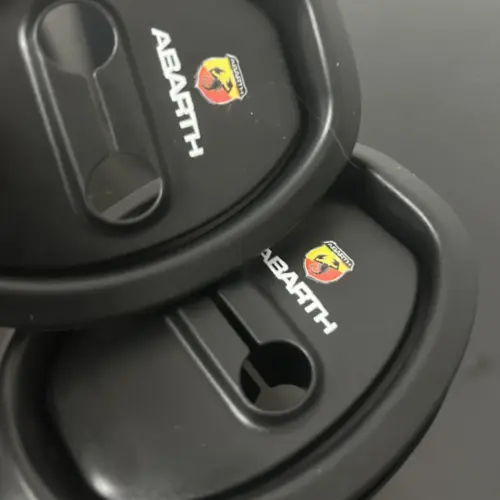 2x Abarth Türgummi Schlossgummi Dichtung links und rechts Abdeckung Schutz – Ansicht 1