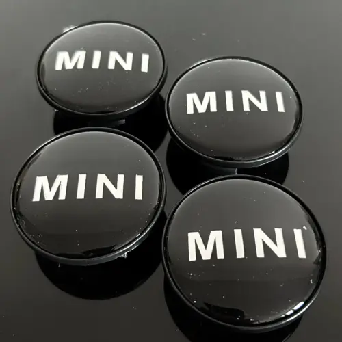 4x 56mm für MINI schwarz glänzend Rand schwarz Felgendeckel Nabenkappen Rad Felgenkappen Nabendeckel Kappe